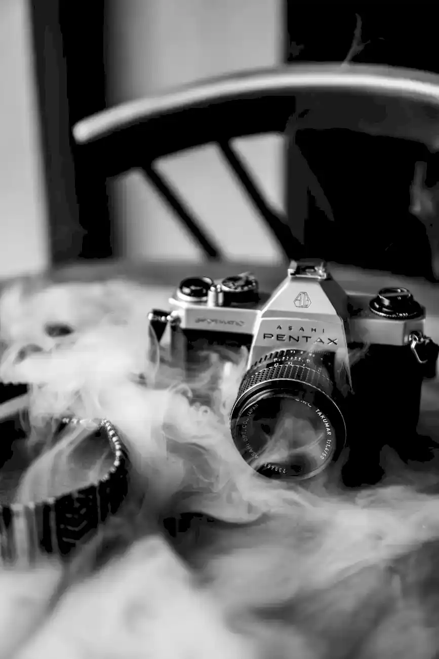 steam and camera on table in black and white